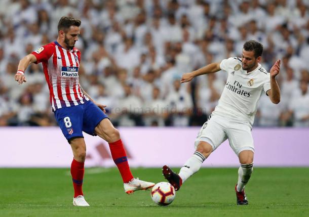 Nacho y Saúl pelean un balón I Foto: Real Madrid