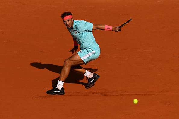 Nadal sliding to victory (Shaun Botterill/Getty Images)