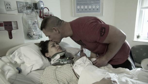 John Cena comforts Nikki Bella after her surgey (image: yahoo.com)