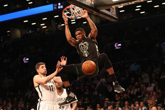 Milwaukee Bucks forward Giannis Antetokounmpo (34) dunks the ball past Brooklyn Nets forward Joe Harris (12). Photo by Anthony Gruppuso-USA TODAY Sports.   