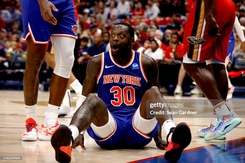 Julius Randle #30 of the New York Knicks reacts after being called for a charging foul during the third quarter of an NBA game against the New Orleans Pelicans at Smoothie King Center on October 28, 2023 in New Orleans, Louisiana. (Photo by Sean Gardner/Getty Images)