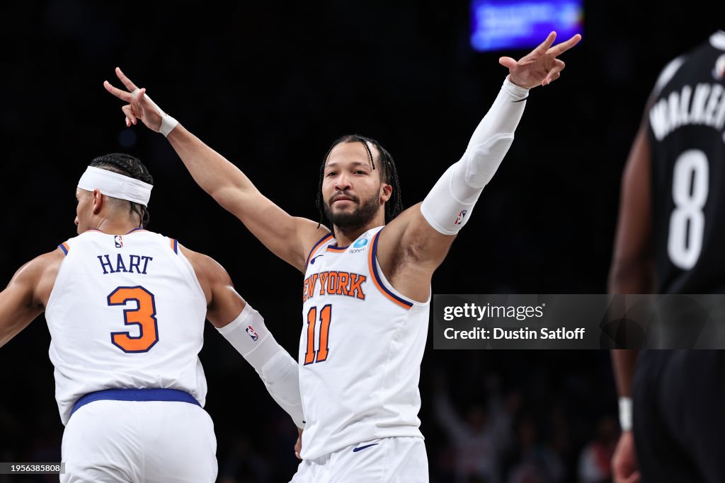  Jalen Brunson #11 of the New York Knicks reacts after making a three pointer during the fourth quarter of the game against the Brooklyn Nets at Barclays Center on January 23, 2024 in New York City. NOTE TO USER: User expressly acknowledges and agrees that, by downloading and or using this photograph, User is consenting to the terms and conditions of the Getty Images License Agreement. (Photo by Dustin Satloff/Getty Images)