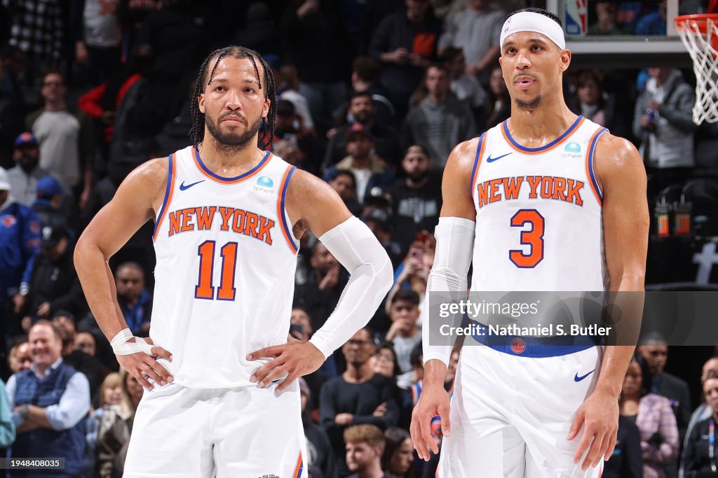 Jalen Brunson #11 and Josh Hart #3 of the New York Knicks look on during the game against the Brooklyn Nets on January 23, 2024 at Barclays Center in Brooklyn, New York. NOTE TO USER: User expressly acknowledges and agrees that, by downloading and or using this Photograph, user is consenting to the terms and conditions of the Getty Images License Agreement. Mandatory Copyright Notice: Copyright 2024 NBAE (Photo by Nathaniel S. Butler/NBAE via Getty Images)