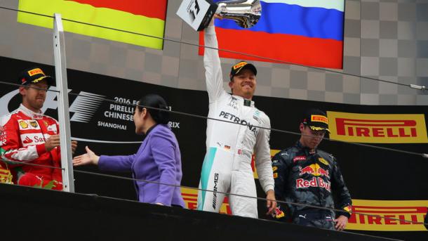 Rosberg celebrates his sixth consecutive win on the podium. (Image credit: Sky Sports F1)