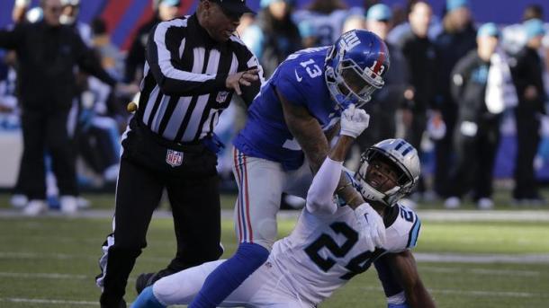 Norman and Beckham Jr. did not hold back against each other when the Panthers and Giants squared off. (Source: Julie Jacobson/AP)