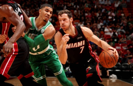 Goran Dragic handles the ball during the game against the Boston Celtics. Photo by Issac Baldizon/NBAE via Getty Images