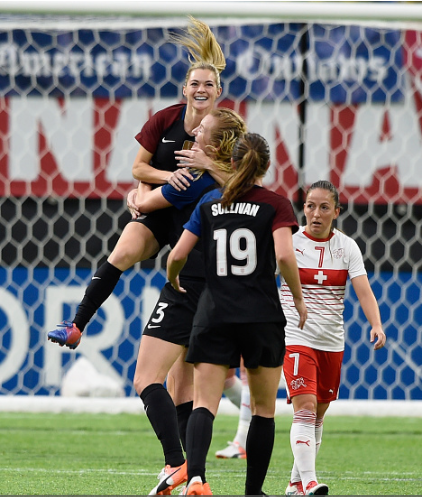 Kealia Ohai (#7) is congratulated by Samantha Mewis (#3) and Andi Sullivan (#19) after scoring her first international goal. | Photo: Hannah Foslien - Getty Images