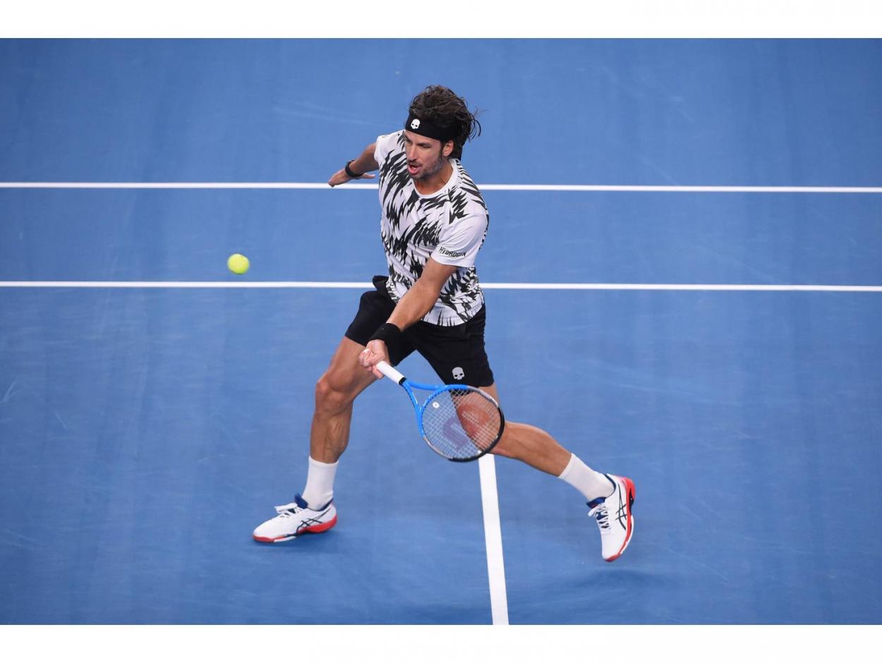 Lopez in action against Tsonga/Photo: Corinne Dubreuil/Open 13 Provence