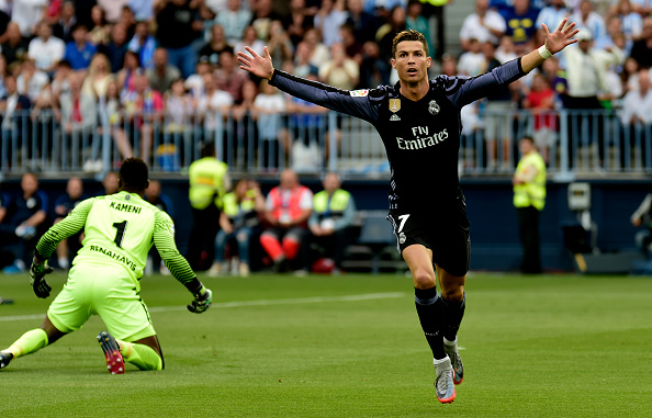 Cristiano comemora seu gol relâmpago (Foto: Jose Jordan/Getty Images)