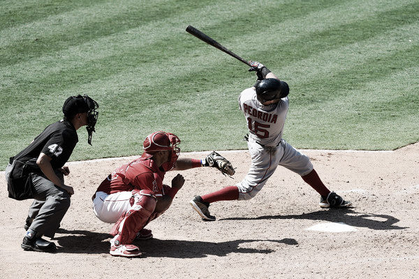 Dustin Pedroia hits a three run homer in the ninth inning. (Photo: Lisa Blumenfeld/Getty Images North America)