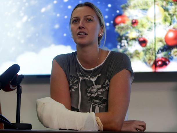 Kvitova speaking to the media, with her left hand wrapped in a cast, in her first public appearance since the attack. Photo credit: Reuters.