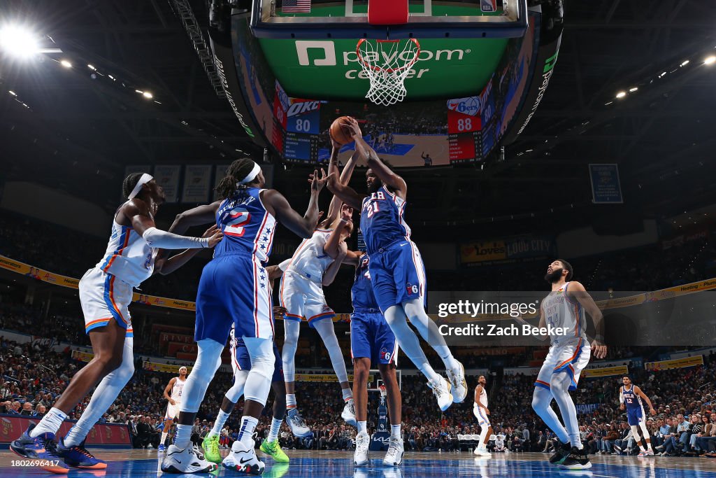 Joel Embiid #21 of the Philadelphia 76ers grabs rebound during the game against the Oklahoma City Thunder on November 25, 2023 at Paycom Arena in Oklahoma City, Oklahoma. NOTE TO USER: User expressly acknowledges and agrees that, by downloading and or using this photograph, User is consenting to the terms and conditions of the Getty Images License Agreement. Mandatory Copyright Notice: Copyright 2023 NBAE (Photo by Zach Beeker/NBAE via Getty Images)