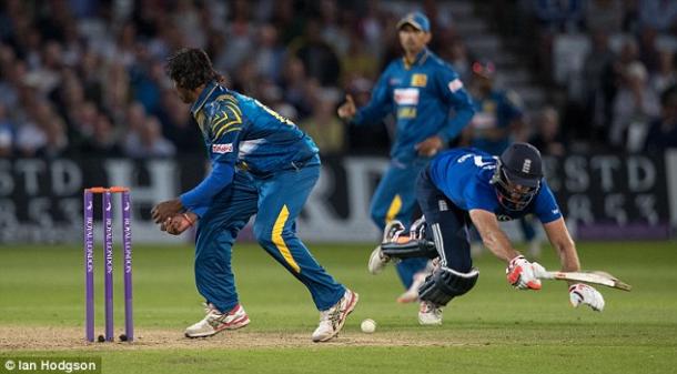 Plunkett and Woakes rushed to make three off the penultimate ball (photo: Ian Hodgson)