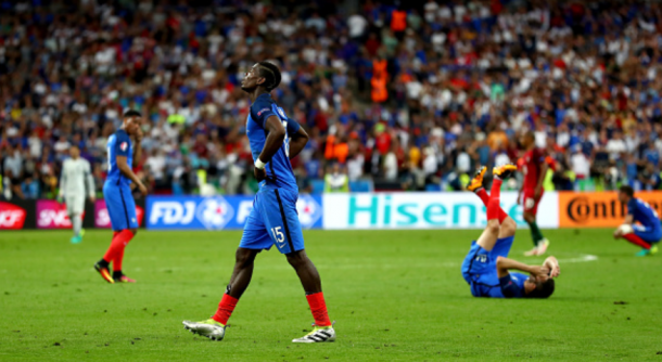 Pogba (centre) is set to become the world's first £100m player, a month after falling short in the Euro final with France. | Photo: Getty