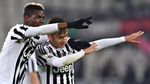 Paul Pogba celebrates with teammate Paulo Dybala | Photo: espnfc.com