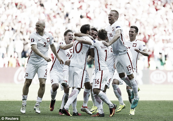 Above: Poland celebrating their penalty shootout victory over Switzerland | Photo: Reuters