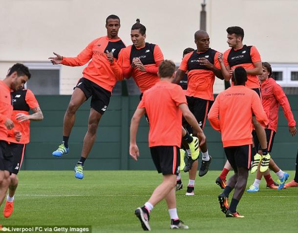 Liverpool's squad are put through their paces in pre-season training (photo; Getty Images)