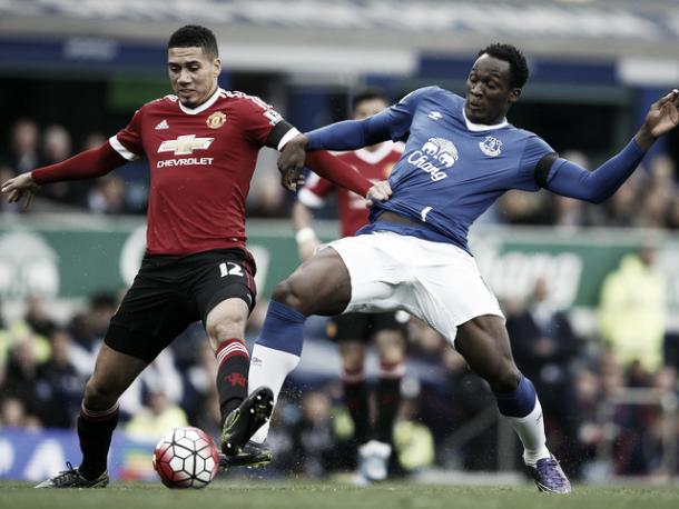 Chris Smalling and Romelu Lukaku battle for the ball when the sides last met in October. | Photo: Getty Images