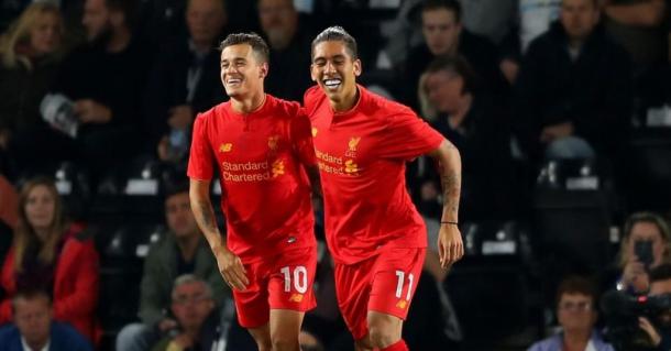 The Brazilian duo celebrate after Philippe Coutinho scores (Photo: Google) 