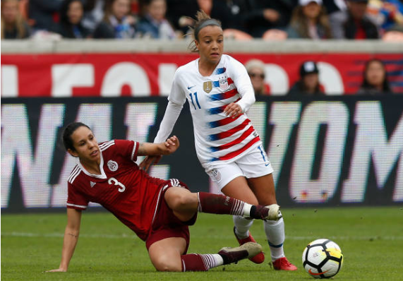 Mallory Pugh (right) is defended by Bianca Sierra in the Aoril 8th meeting between USA and Mexico. | Photo: Tim Warner - Getty Images