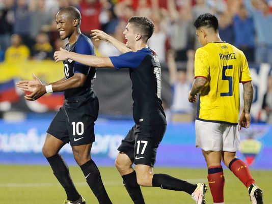 Pulisic (right) celebrates with Darlington Nagbe (left) after the latter's late winner - Ecuador. (Source: Brandon Wade/EPA)