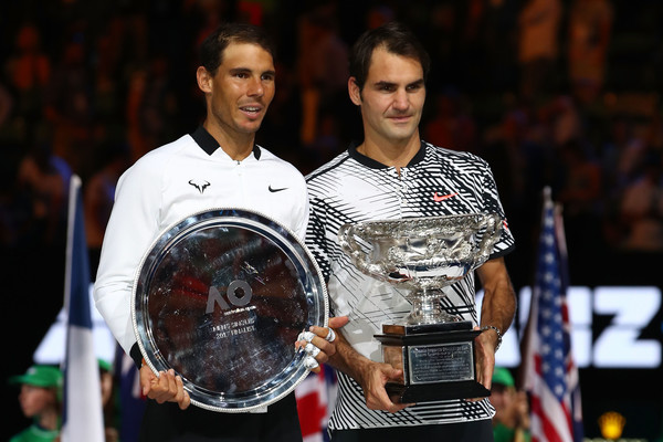 Nadal (left) lost to rival Federer (right) who won his 18th Grand Slam singles title and first since Wimbledon in 2012 (Photo by Clive Brunskill / Getty)