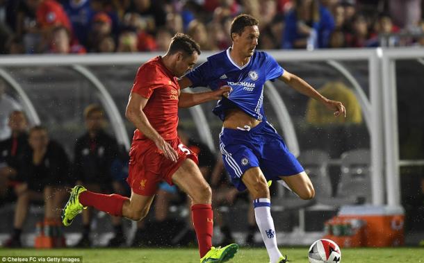 Randall battles for possession during a competitive friendly match (photo; Getty Images)