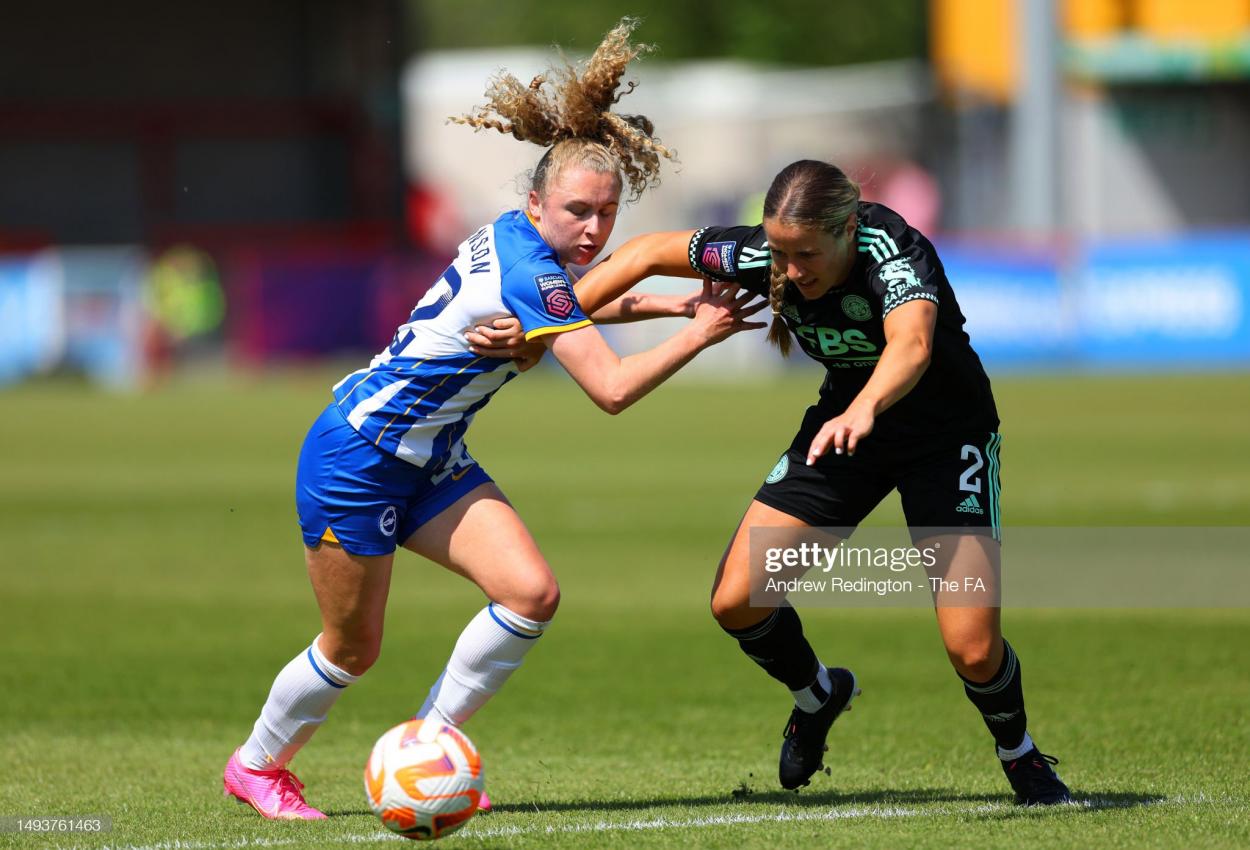 Katie Robinson of Brighton & Hove Albion and Courtney Nevin of Leicester City battle for possession during the FA Women's Super League match between Brighton & Hove Albion and Leicester City at Broadfield Stadium on May 27, 2023 in Crawley, England. (Photo by Andrew Redington - The FA/The FA via Getty Images)