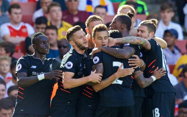The Reds' celebrate Coutinho's goal to make it 3-1. (Picture: Getty Images)