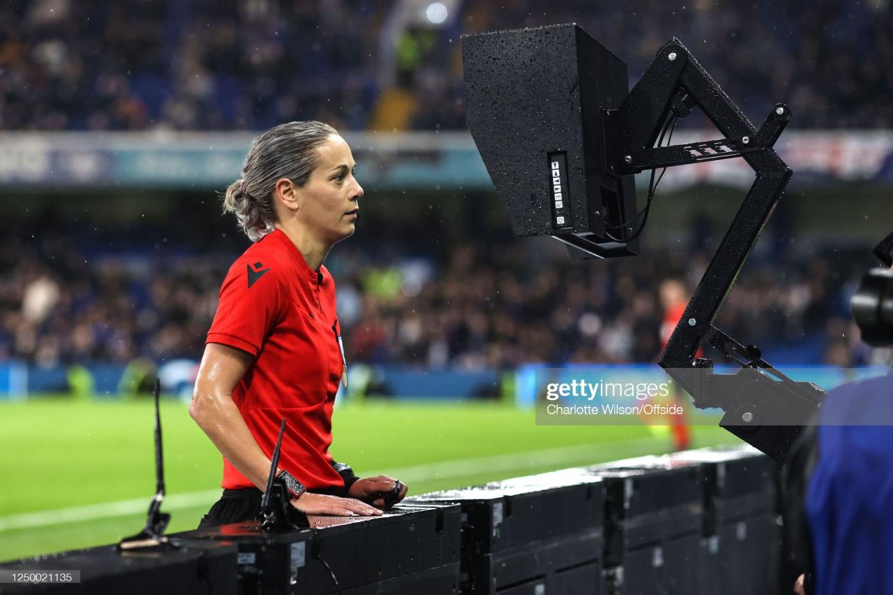 Referee Ivana Martincic checks VAR for a Chelsea penalty during the UEFA Women's <strong><a  data-cke-saved-href='https://www.vavel.com/en/football/2023/03/30/womens-football/1142206-we-can-beat-anyone-jonas-eidevall-reflects-on-historic-night-for-arsenal.html' href='https://www.vavel.com/en/football/2023/03/30/womens-football/1142206-we-can-beat-anyone-jonas-eidevall-reflects-on-historic-night-for-arsenal.html'>Champions League</a></strong> quarter-final 2nd leg match between Chelsea FC and Olympique Lyonnais at <strong><a  data-cke-saved-href='https://www.vavel.com/en/football/2023/03/29/womens-football/1142159-hayes-knows-what-to-expect-from-lyon.html' href='https://www.vavel.com/en/football/2023/03/29/womens-football/1142159-hayes-knows-what-to-expect-from-lyon.html'>Stamford Bridge</a></strong> on March 30, 2023 in London, United Kingdom. (Photo by Charlotte Wilson/Offside/Offside via Getty Images)