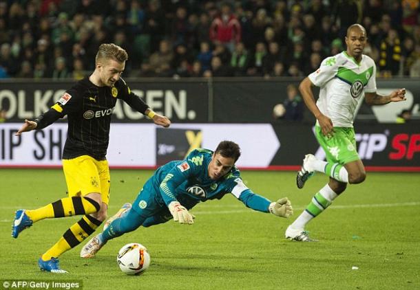 Reus rounds Benaglio to open the scoring (photo: getty)