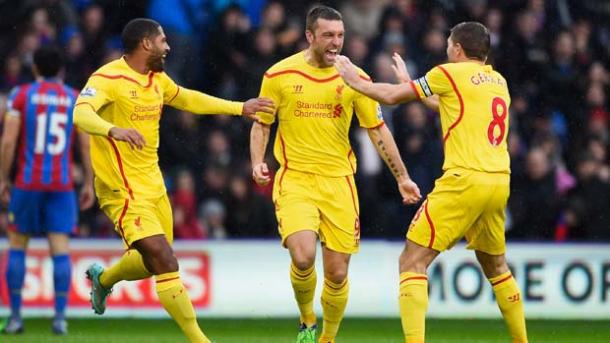 Lambert celebra su primer tanto con el Liverpool. Foto: Premier League