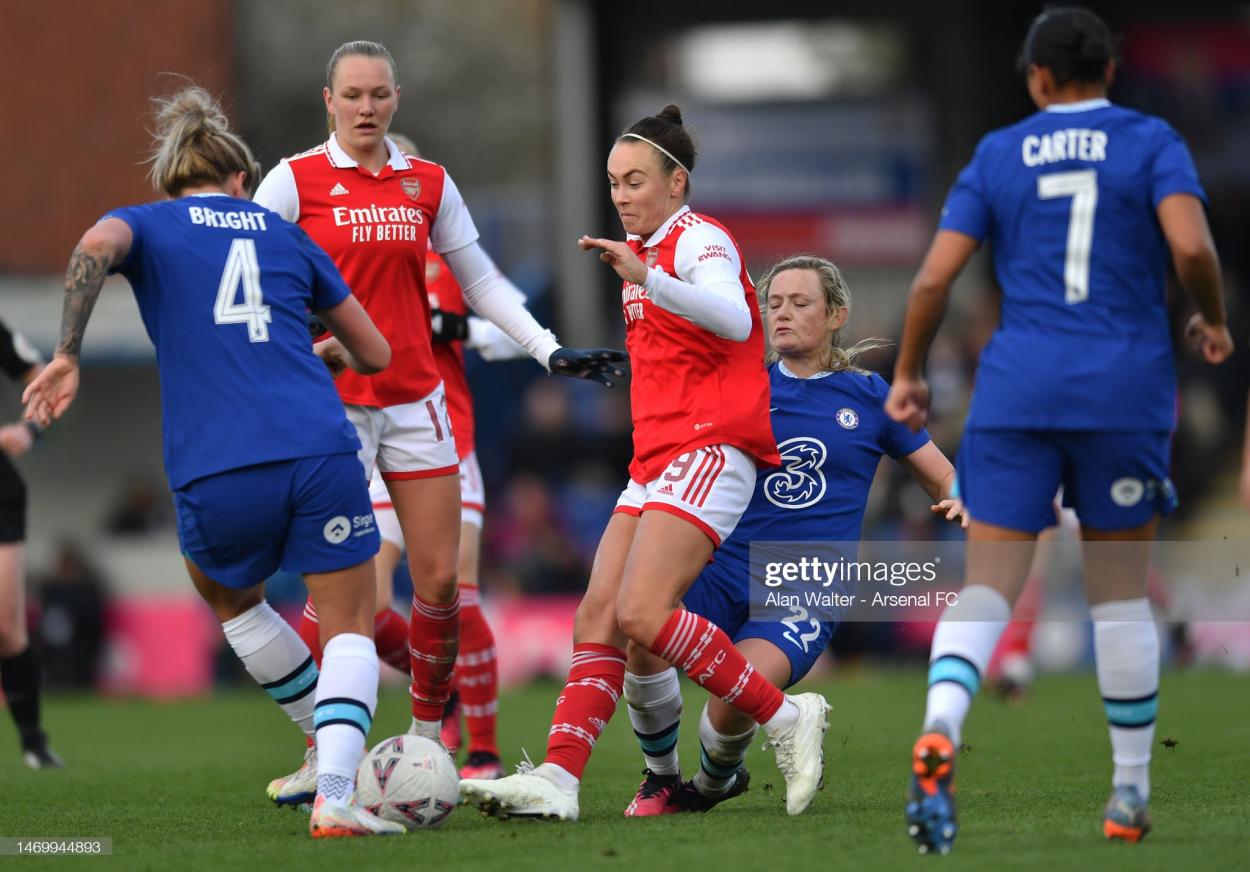 Caitlin Foord is pressured by Erin Cuthbert and Millie Bright.  (Photo by Alan Walter - Arsenal FC/Arsenal FC via Getty Images)