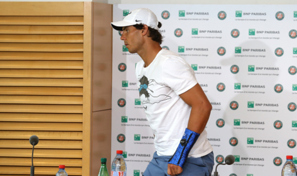 Nadal looked disappointed during his Roland Garros presser, where he confirmed he had another wrist injury. | Photo: Getty