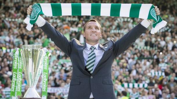 Brendan Rodgers holds scarf aloft in front of 13,000 fans