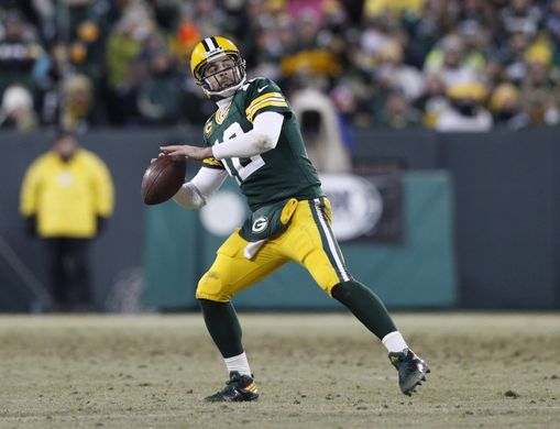 Aaron Rodgers throws Hail Mary to end the first half. | Photo: USA Today Sports