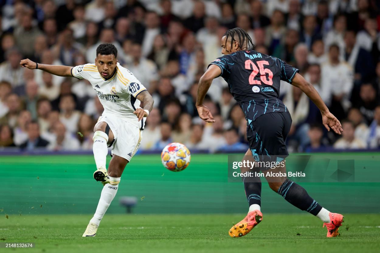 Rodrygo Goes of <strong><a  data-cke-saved-href='https://www.vavel.com/en-us/soccer/2024/04/10/1179129-six-goal-thriller-real-madrid-snatch-draw-in-enthralling-quarter-final-tie.html' href='https://www.vavel.com/en-us/soccer/2024/04/10/1179129-six-goal-thriller-real-madrid-snatch-draw-in-enthralling-quarter-final-tie.html'>Real Madrid</a></strong> CF with the ball during the UEFA <strong><a  data-cke-saved-href='https://www.vavel.com/en-us/soccer/2024/04/16/1179815-nightmare-in-germany-for-atletico-de-madrid.html' href='https://www.vavel.com/en-us/soccer/2024/04/16/1179815-nightmare-in-germany-for-atletico-de-madrid.html'>Champions League</a></strong> quarter-final first leg match between <strong><a  data-cke-saved-href='https://www.vavel.com/en-us/soccer/2024/04/10/1179129-six-goal-thriller-real-madrid-snatch-draw-in-enthralling-quarter-final-tie.html' href='https://www.vavel.com/en-us/soccer/2024/04/10/1179129-six-goal-thriller-real-madrid-snatch-draw-in-enthralling-quarter-final-tie.html'>Real Madrid</a></strong> CF and <strong><a  data-cke-saved-href='https://www.vavel.com/en-us/soccer/2024/04/14/1179608-aston-villa-derails-arsenals-premier-league-aspirations.html' href='https://www.vavel.com/en-us/soccer/2024/04/14/1179608-aston-villa-derails-arsenals-premier-league-aspirations.html'>Manchester City</a></strong> at Estadio Santiago Bernabeu on April 09, 2024 in Madrid, Spain. (Photo by Ion Alcoba Beitia/Getty Images)