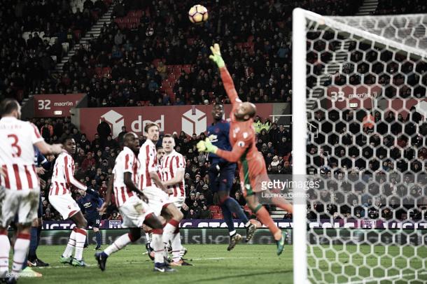 Wayne Rooney breaks the United scoring record with a beauty  (Photo by Laurence Griffiths/Getty Images)