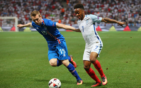 Sterling (right) in action for England at this summer's European Championships - where his performances were under intense scrutiny. | Photo: Getty