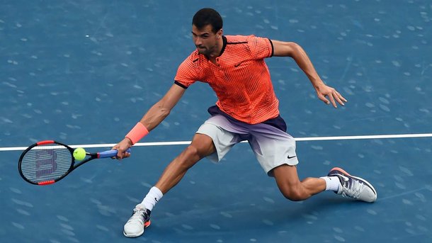 Dimitrov during his semi-final match in Chengdu (Photo by STR/AFP/Getty Images)