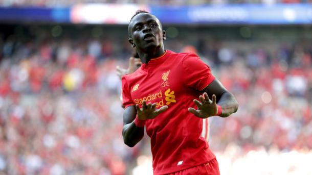 Mane celebrates scoring against Barcelona on Saturday. (Picture: Getty Images)