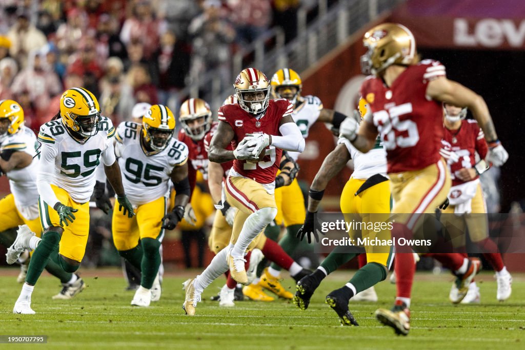 Deebo Samuel #19 of the San Francisco 49ers runs with the ball during an NFL divisional round playoff football game between the San Francisco 49ers and the Green Bay Packers at Levi's Stadium on January 20, 2024 in Santa Clara, California. (Photo by Michael Owens/Getty Images)