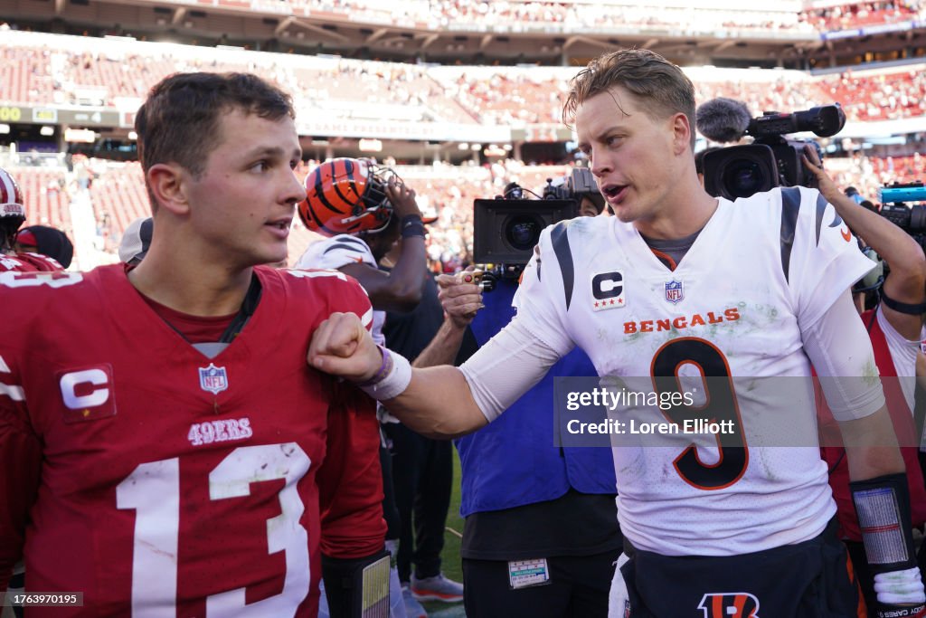 Brock Purdy #13 of the San Francisco 49ers talks with Joe Burrow #9 of the Cincinnati Bengals after the game at Levi's Stadium on October 29, 2023 in Santa Clara, California. (Photo by Loren Elliott/Getty Images)