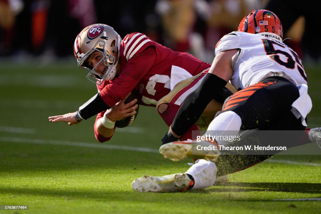 Brock Purdy #13 of the San Francisco 49ers is tackled by Logan Wilson #55 of the Cincinnati Bengals during the third quarter of the game at Levi's Stadium on October 29, 2023 in Santa Clara, California. (Photo by Thearon W. Henderson/Getty Images)