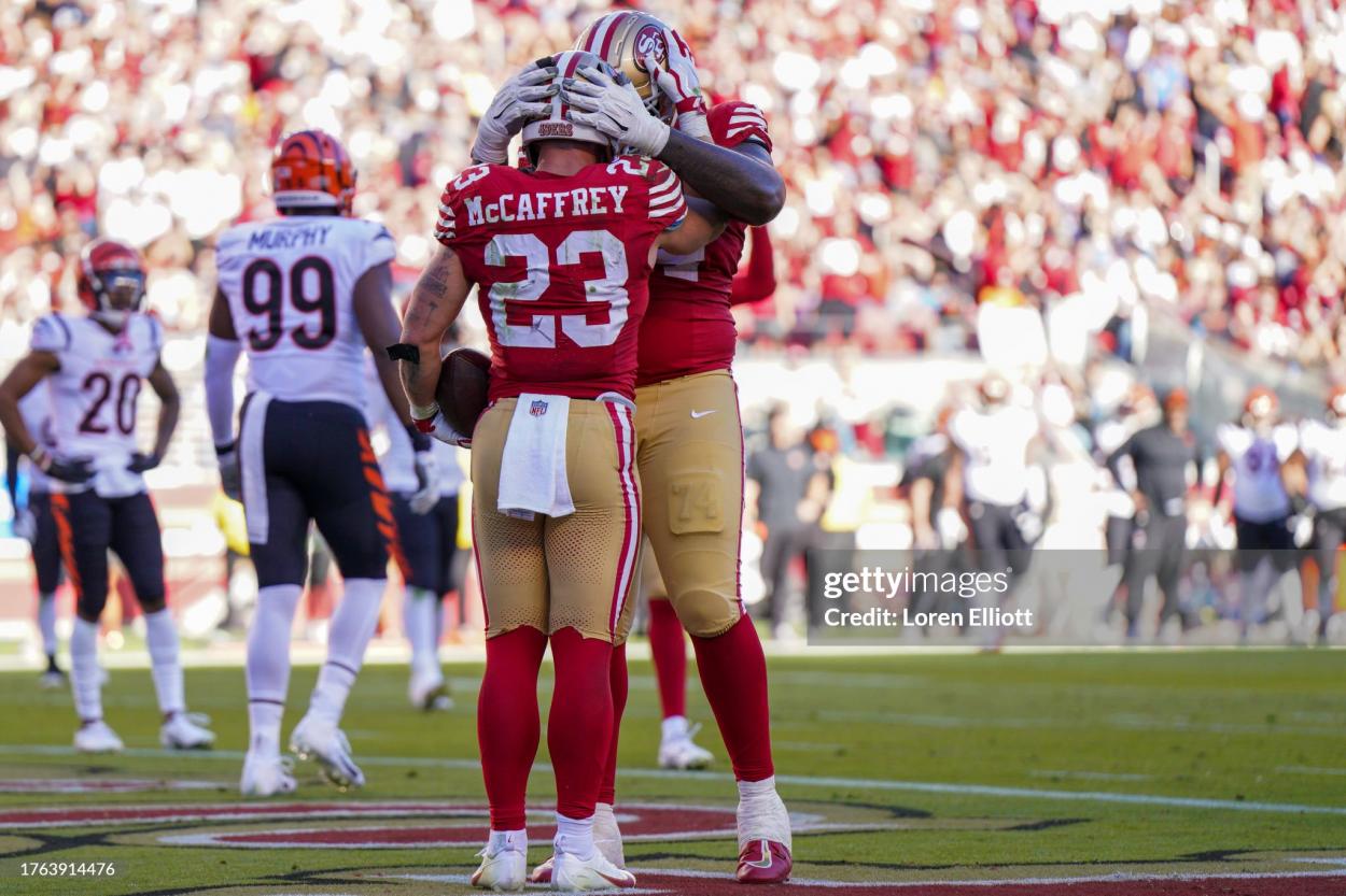 Christian McCaffrey #23 of the San Francisco 49ers celebrates after scoring a touchdown during the fourth quarter of the game against the Cincinnati Bengals at Levi's Stadium on October 29, 2023 in Santa Clara, California. (Photo by Loren Elliott/Getty Images)