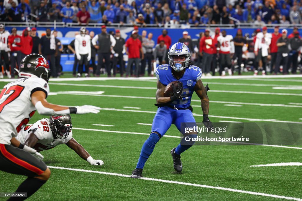 Detroit Lions running back Jahmyr Gibbs (26) runs with the ball after catching a pass during a play during an NFL NFC Divisional playoff football game between the Tampa Bay Buccaneers and the Detroit Lions on January 21, 2024 at Ford Field in Detroit, Michigan. (Photo by Scott W. Grau/Icon Sportswire via Getty Images)
