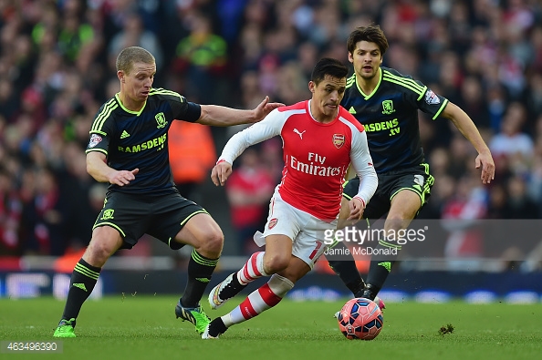 Alexis Sanchez (centre) finds space between Boro's Leadbitter and Friend in their 2015 FA Cup meeting | Photo: Getty