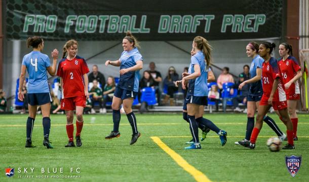 McCaskill and Lloyd celebrate a McCaskill goal against St. John's University l Photo: Jeffrey Auger/Sky Blue FC