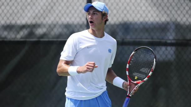 Brayden Schnur fist pumps after winning a point during his days as a collegiate tennis player as a University of North Carolina Tar Heel, before deciding to leave and turn pro earlier this summer. | Photo: University of North Carolina Athletics