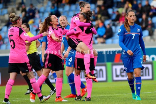 Scotland celebrates Jane Ross' winning penalty Photo: Tommy Hughes